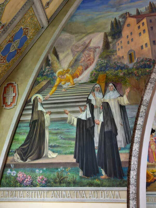 Un ángel trae la comunión a santa Amelia delante de las religiosas